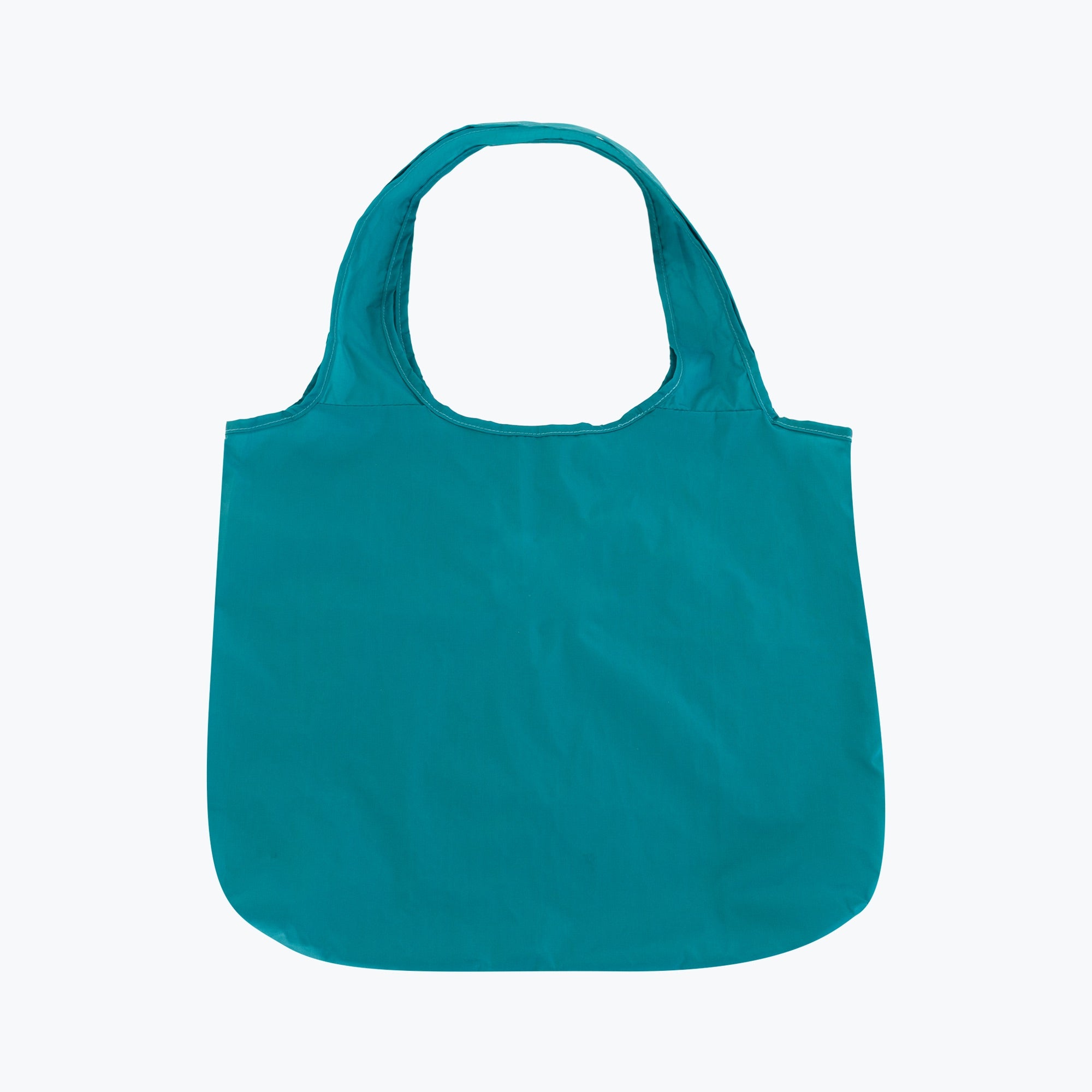 Nomii Pouch with Teal Shopper – The Healthy Back Bag